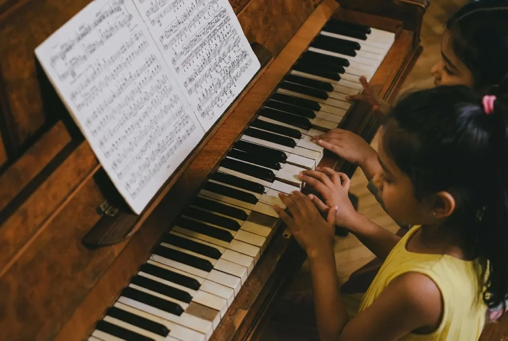 child playing piano Soul of Music