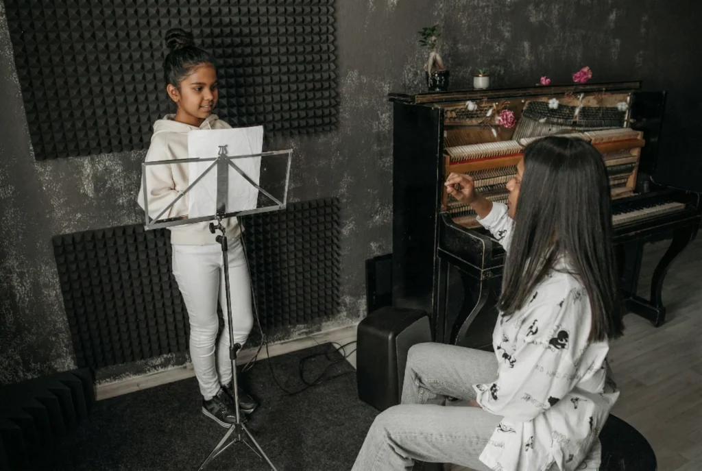 coach teaching student Soul of Music